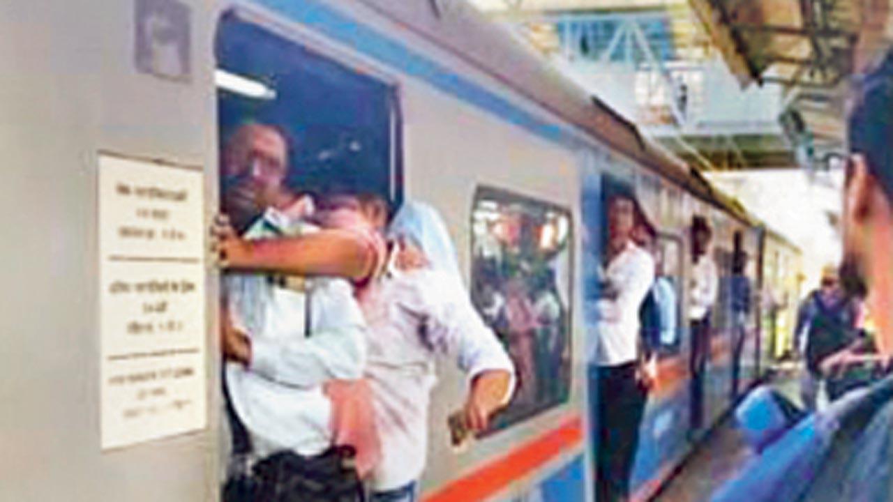 The AC local running with doors open after the snag