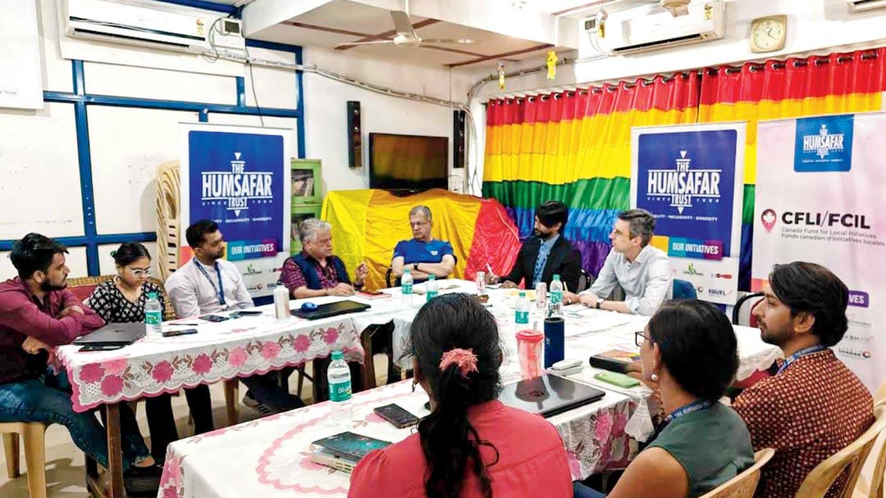 Loufiti (centre) in discussion. Pic Courtesy/Instagram