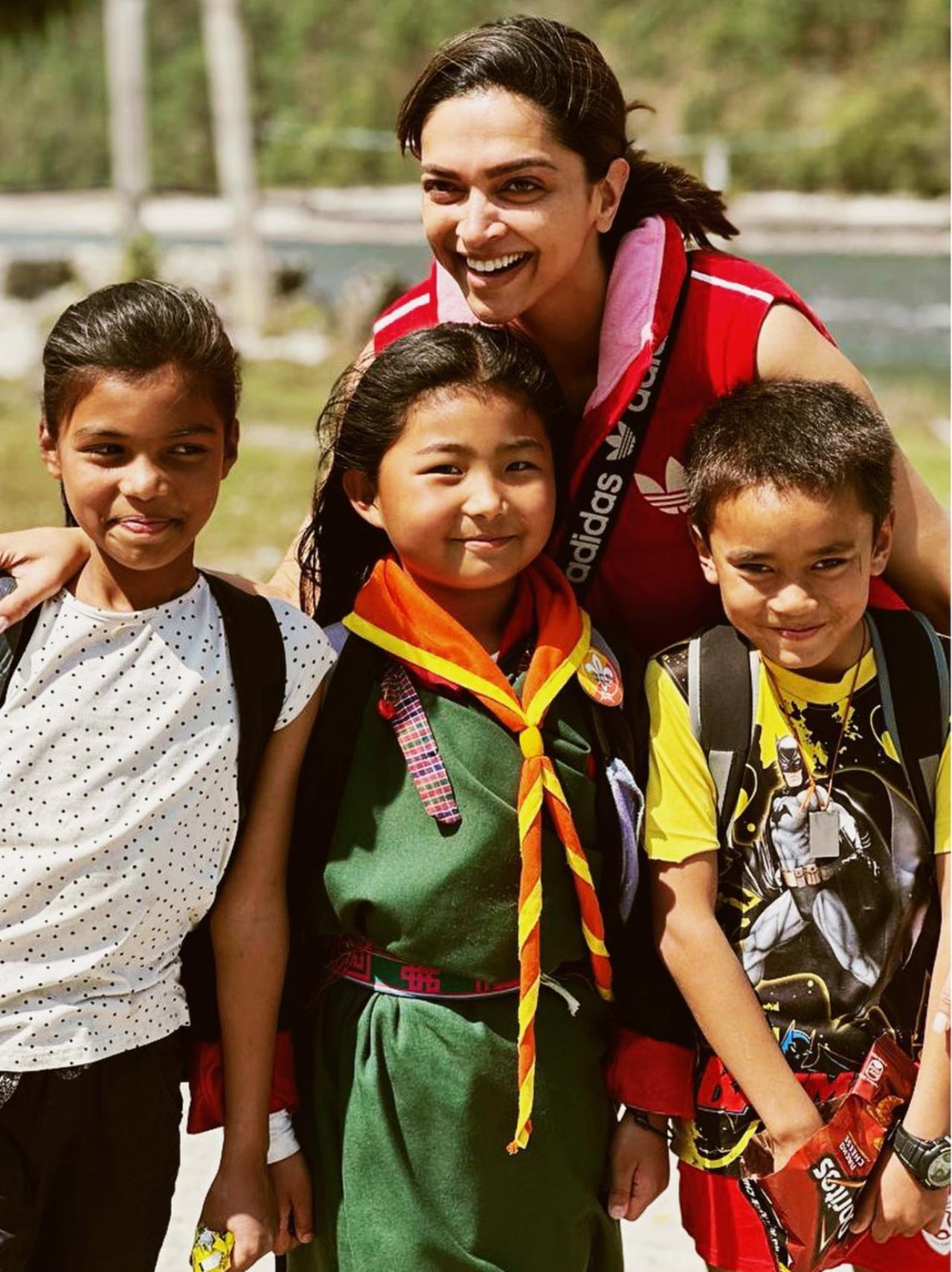 Lastly, Deepika shared a picture of herself posing with a bunch of kids from the country