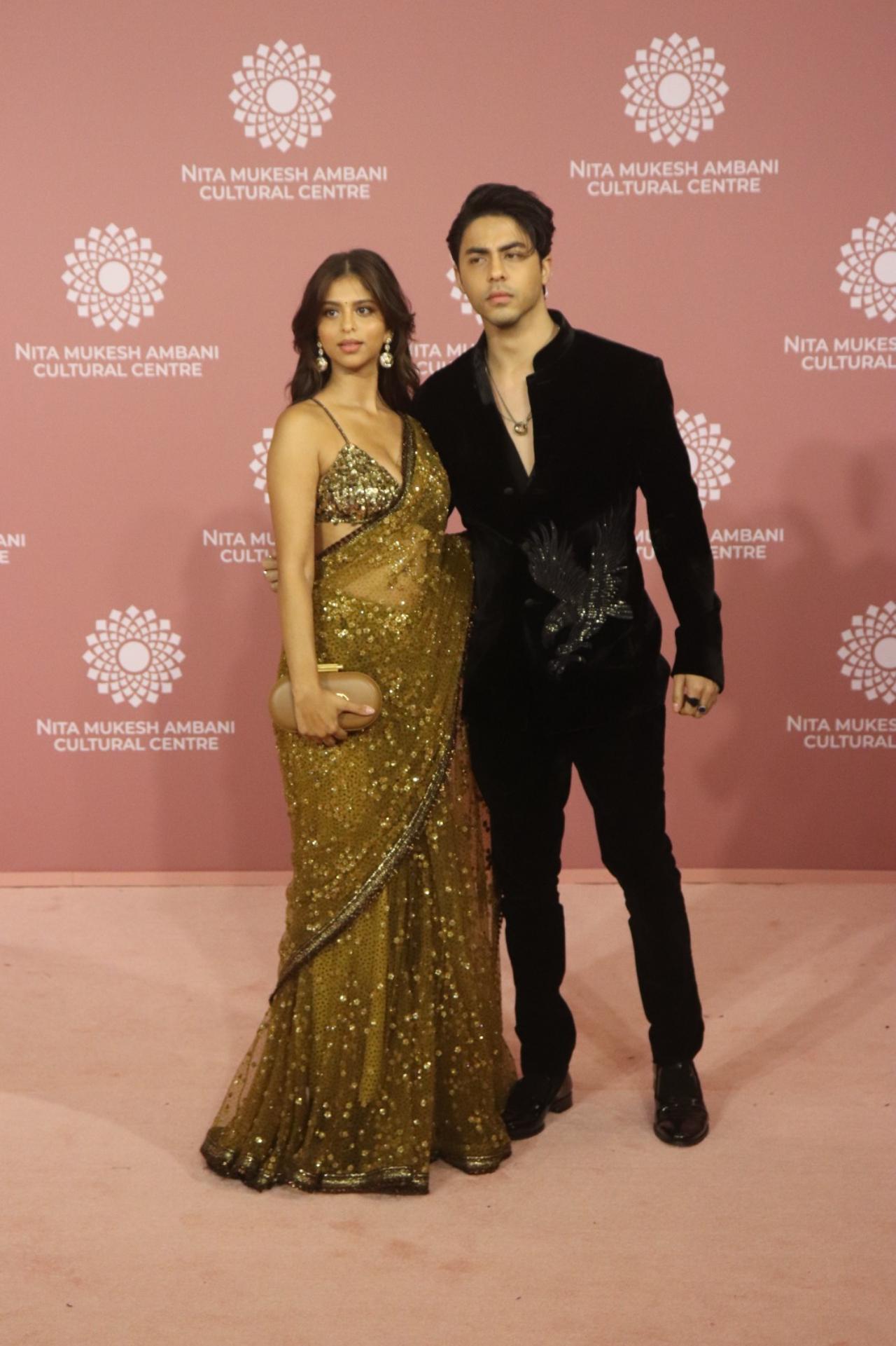 Siblings Suhana Khan and Aryan Khan arrived together for the pink carpet and struck a pose for the paparazzi. While Suhana made a striking appearance in an olive green glittery saree, Aryan kept is sleek in a black outfit