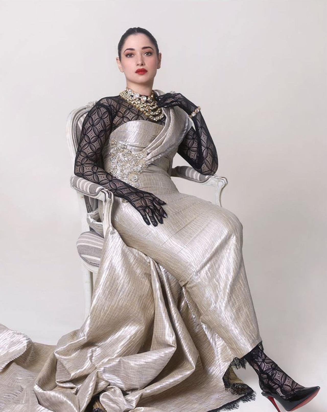 Tamannaah Bhatia, too, experimented with her saree look as she opted for a silver and black saree by Manish Malhotra styled to give a modern twist. 