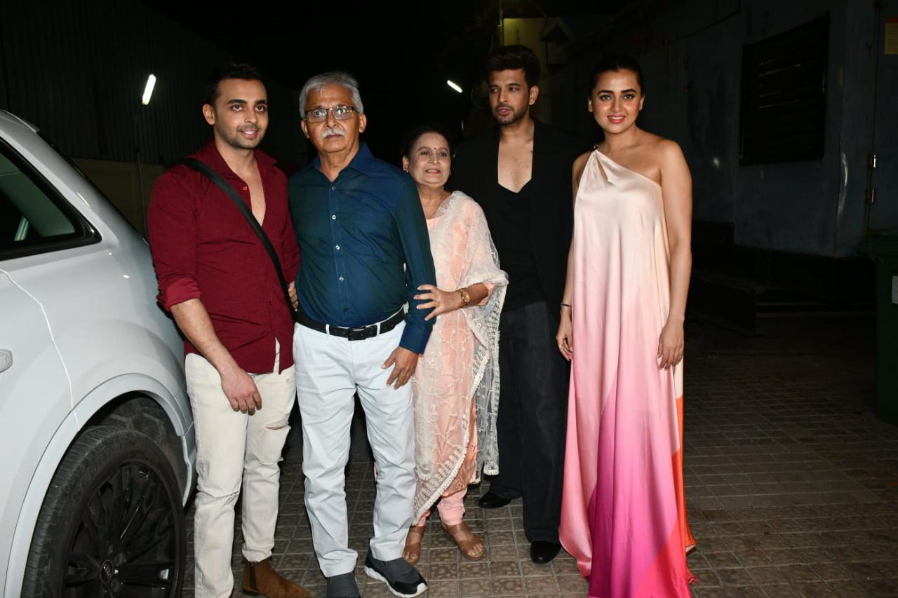 Tejasswi Prakash's family also came to her cheer her for the film. Karan Kundrra posed along with her family at the screening