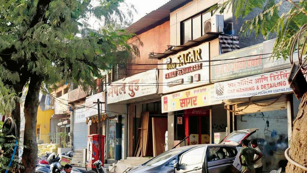The illegal units built on upper floors of the shops along the GMLR