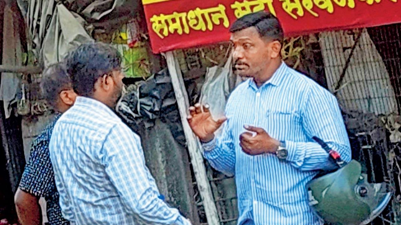 mid-day reporters with the alleged ringleader of the racket Krishna Patil (right). Pics/Rajesh Gupta