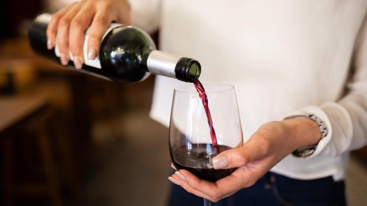 Drinking a glass of wine daily may not harm you: Study