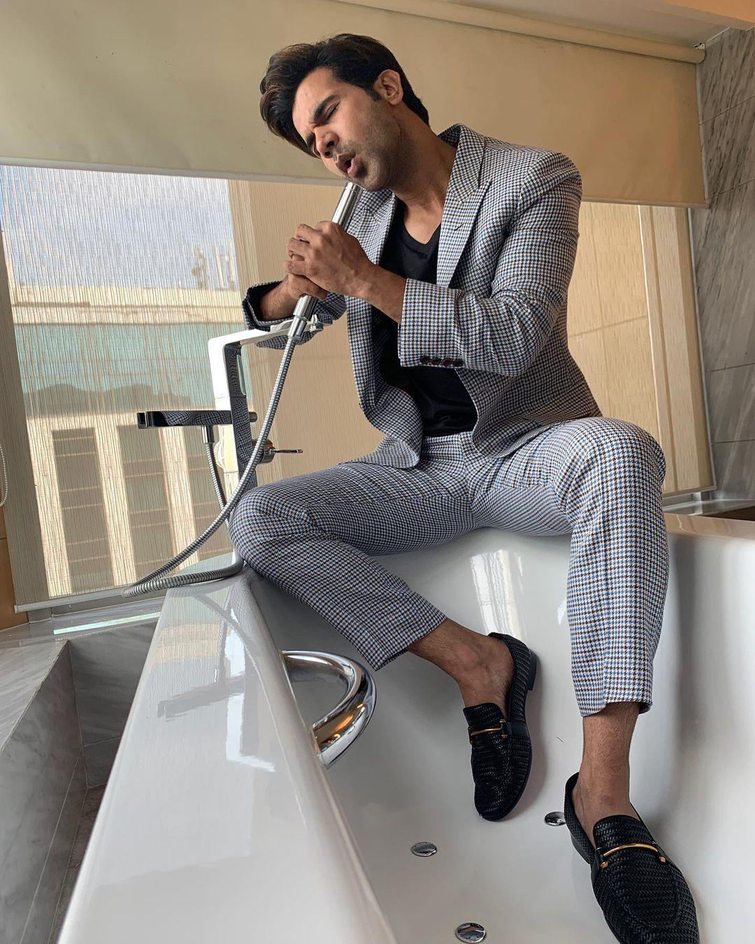 Rajkummar Rao rocks a suave checked suit, bringing a touch of classic charm to his look. The pattern adds a cool twist to his outfit, showing how he effortlessly mixes traditional and modern styles.