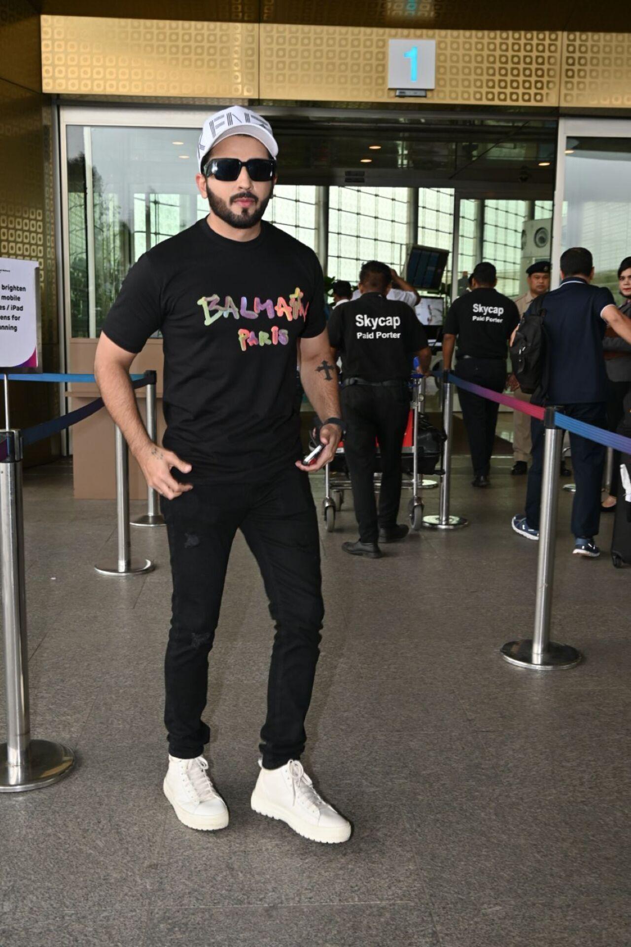 Dheeraj Dhoopar opted for a Black on Balck outfit as he was clicked at the airport