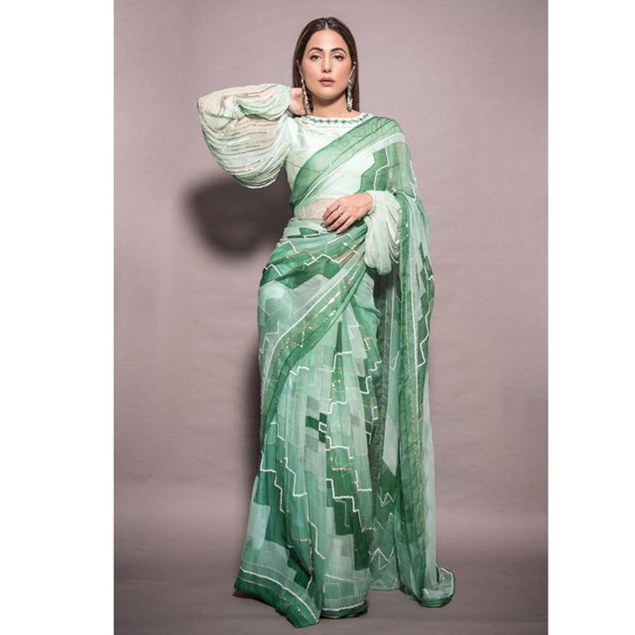 Hina Khan looks effortlessly gorgeous in her green abstract checkered print saree and puff-sleeved long blouse