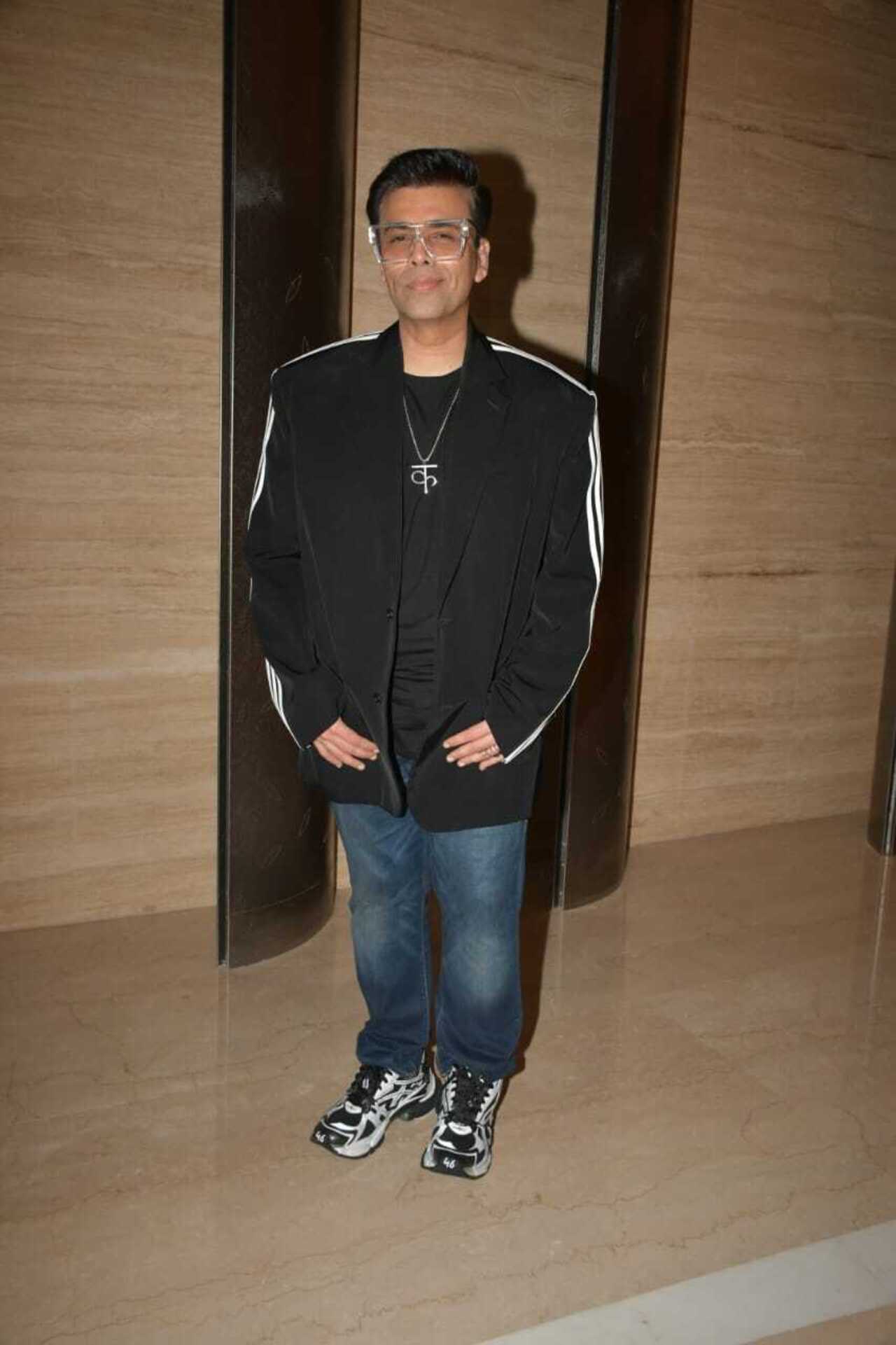 Ace director Karan Johar who hosted the press meet looked smart in jeans, a t-shirt and a black coat