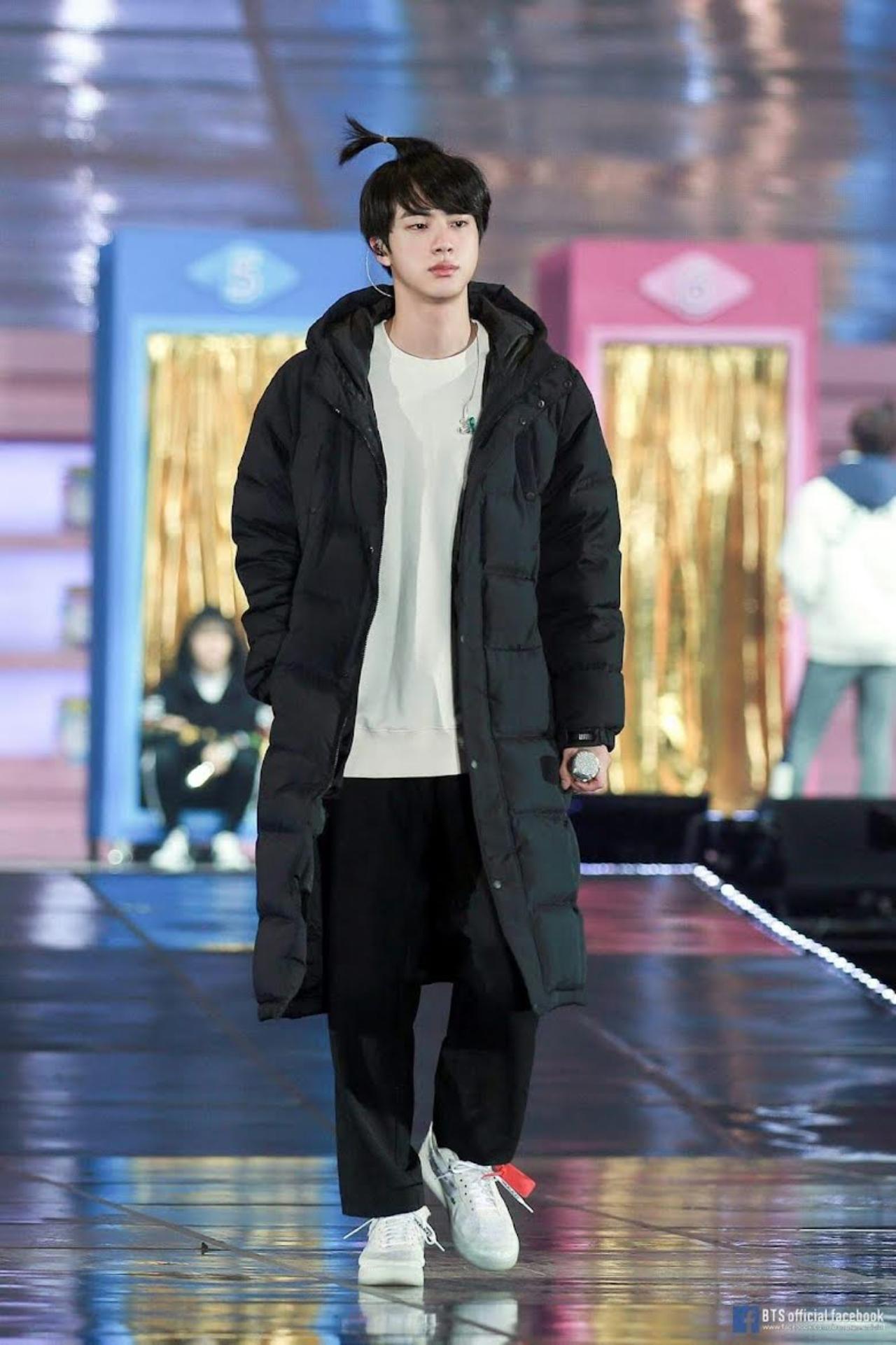 ARMYs admire the sheer confidence with which Jin can pull anything off! Here, he walked down in a cute little ponytail and the tags on his footwear intact once again