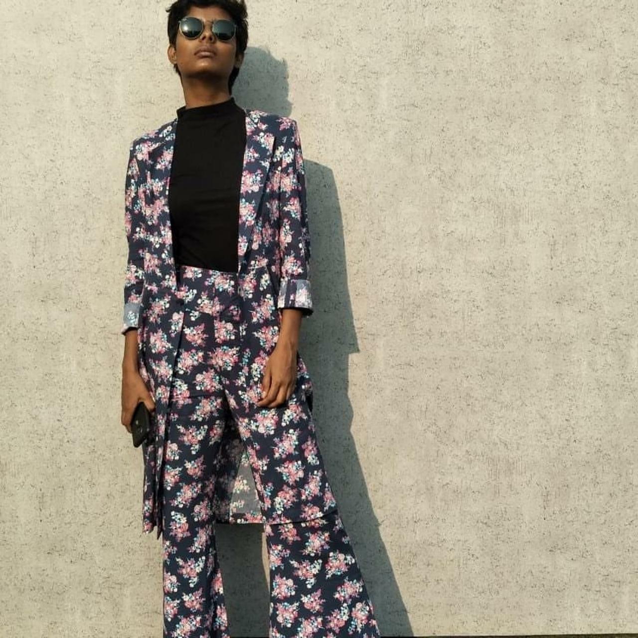 This floral-print suit is embodying gender fluidity at its best!