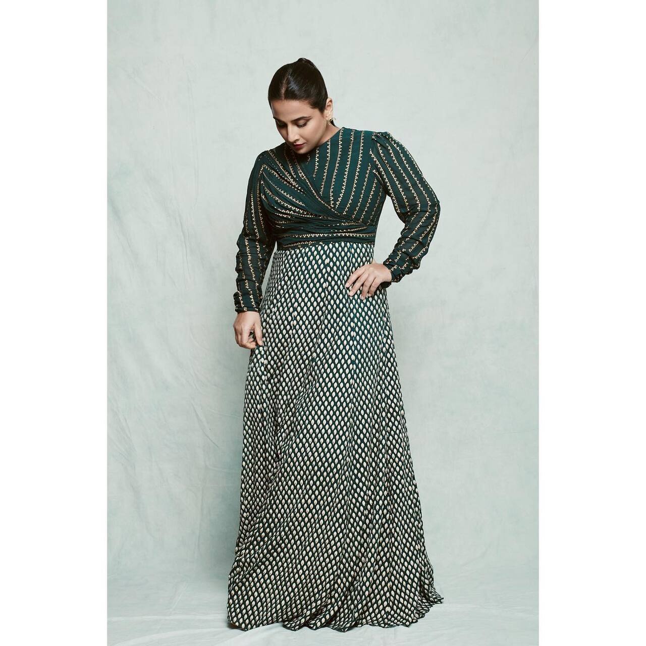Anarkalis are another great option for celebrating Teej - they allow you to move around freely and look glamorous at the same time! Vidya Balan iss timeless in he teal green printed anarkali. The outfit is from the shelves of the clothing brand Bhumika Sharma