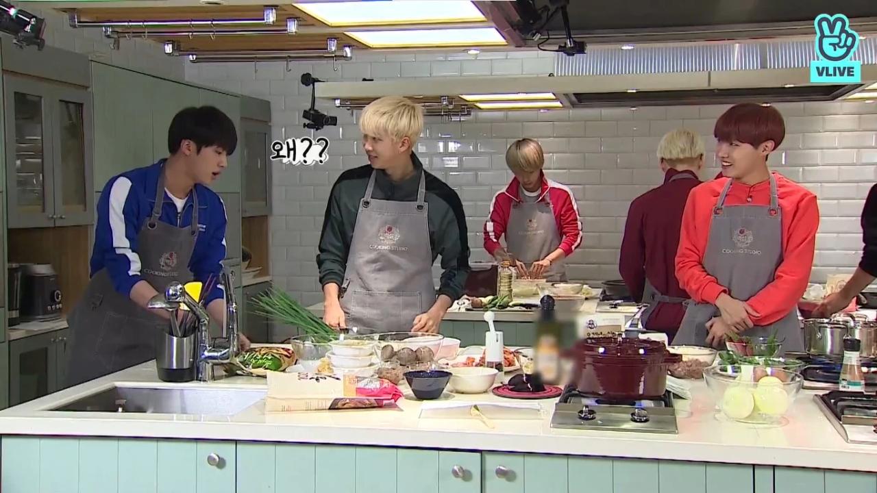 BTS's leader Kim Namjoon aka RM might have an IQ of 148 and eloquent songwriting and rapping skills - but he can be a clumsy gentle giant when it comes to everyday tasks. He once tried to chop an onion with the knife's cover still on it - and here, he tried to straining noodles by putting his hands into the boiling water. No wonder Jin looks so agitated!