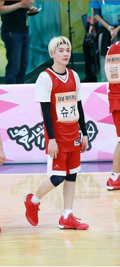 Nothing gets cuter than Suga in a jersey. Here is Suga with one of his 'first loves' (apart from the piano, of course) - and he looks adorably intimidating as he takes to the basketball court
