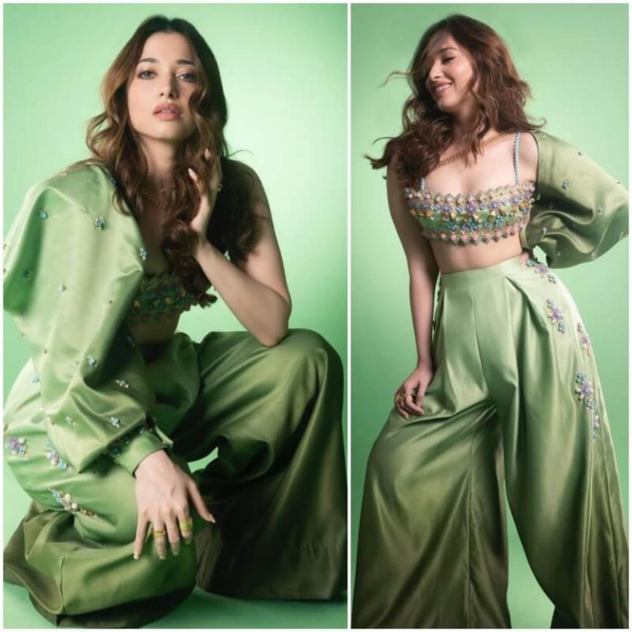 Tamannaah Bhatia is fast rising as a cinematic icon to watch out for. Not only does she stun on screen, but also makes her fans swoon with photographs from her fashion photoshoots. Bhatia looks drop-dead gorgeous in her sequinned bralette and high-waisted green trousers. If you want to put a modern spin on your Hariyali Teej outfit this year, Tamannaah is the one to follow!