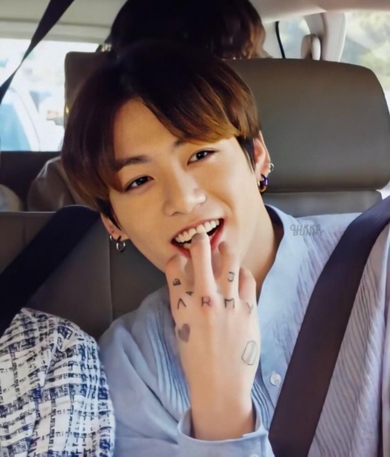 Jungkook has dedicated a few to his bandmates and fans. He has ARMY on the knuckles and ‘+’ symbols, along with J on one of the fingers – the letters translate to the members’ initials; RM aka Namjoon, J for J-hope, Jimin and Jin. The A turned upside down for V aka Kim Taehyung and the Y for Yoongi aka Suga. How coincidental is it that the letters in ARMY also overlap with the names of the BTS members? Proof that the BTS-ARMY bond was meant to be