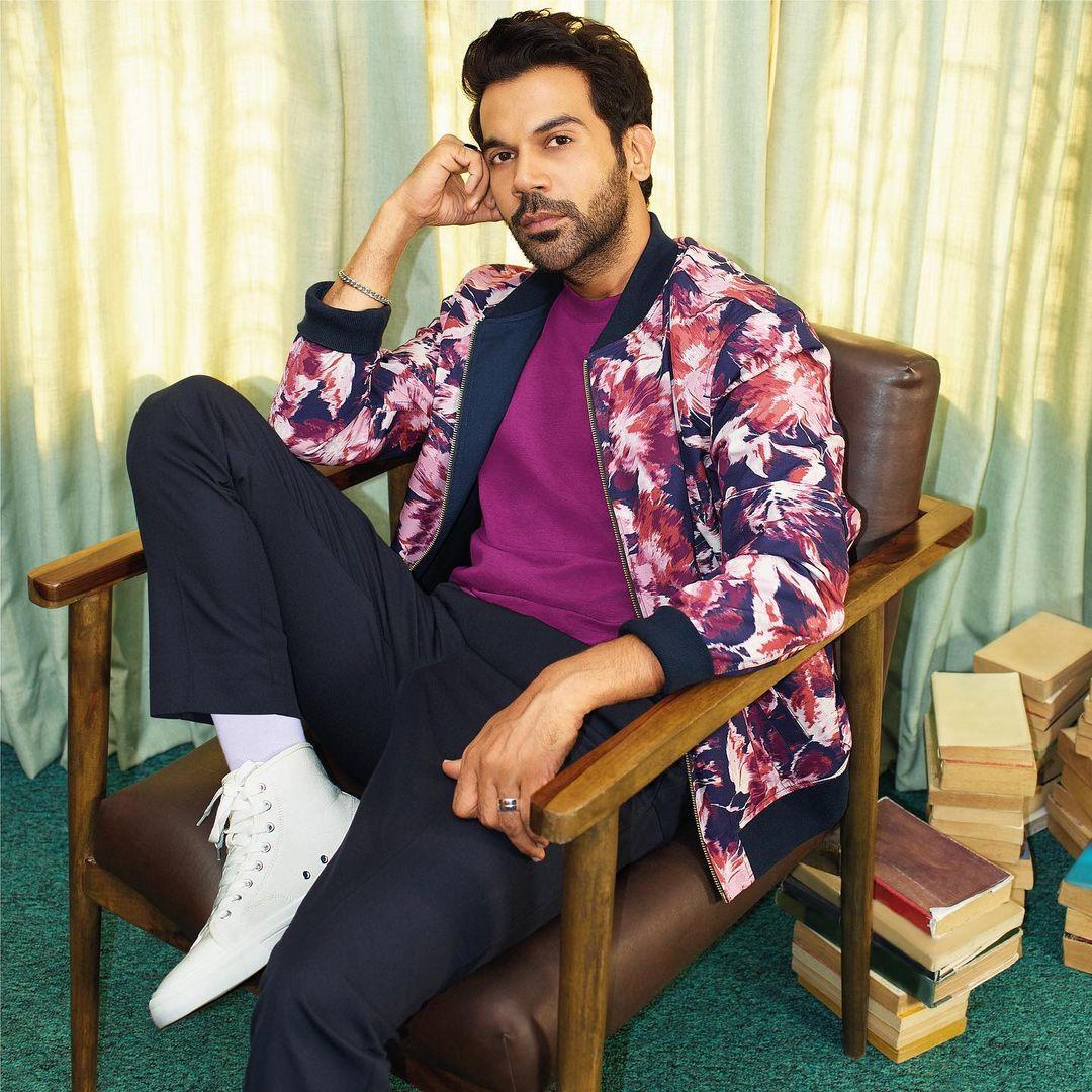 Rajkummar Rao exudes bold confidence in a vibrant purple jacket. The striking color choice adds a pop of energy to his ensemble.