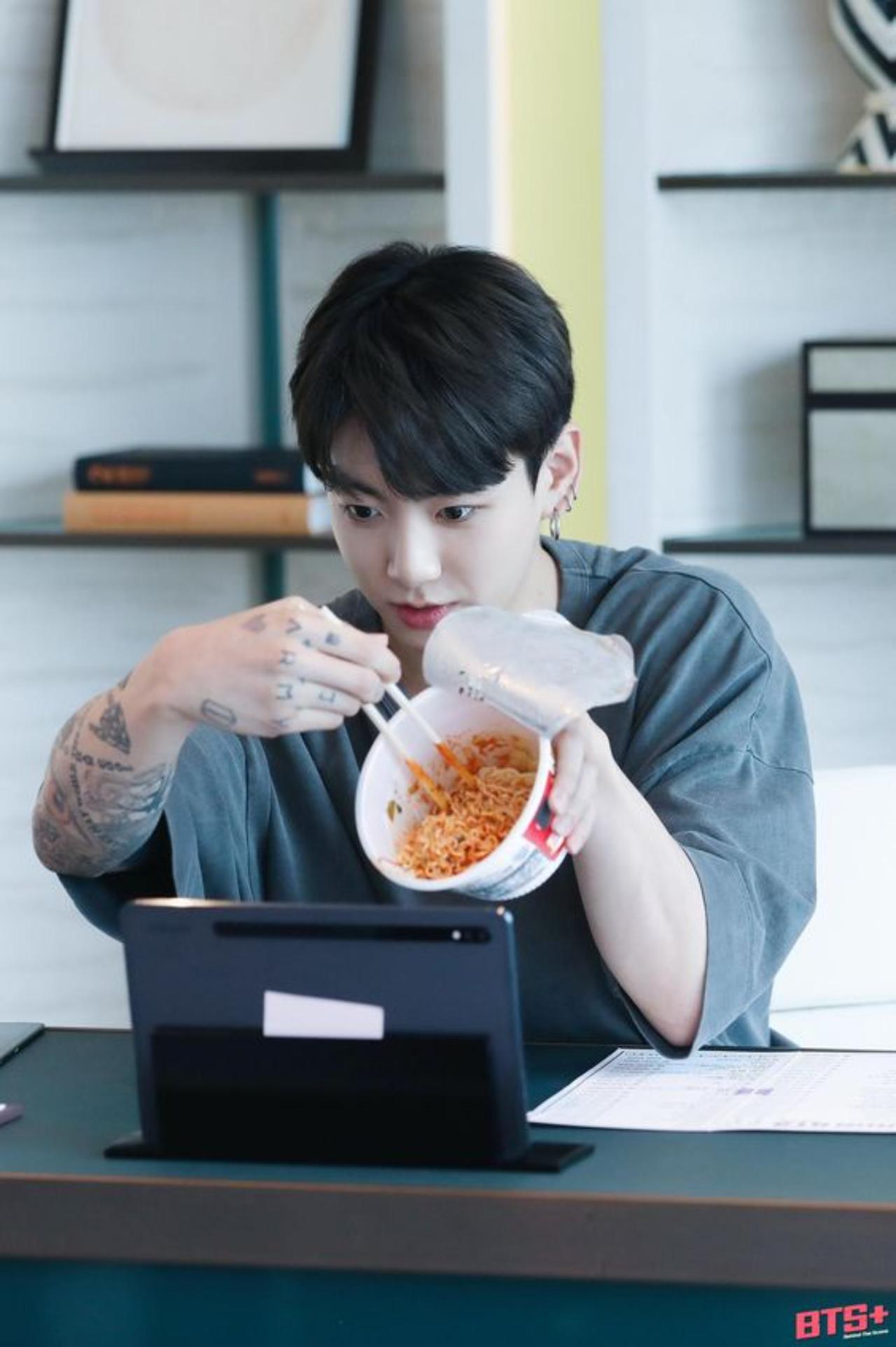 BTS and ramen go hand-in-hand. No matter how full the members might be, there's always that extra bit of reserved tummy room for ramen. Jungkook is the septet's self-proclaimed ramen expert - and boy, does he make our mouth water with his noodle masterpieces