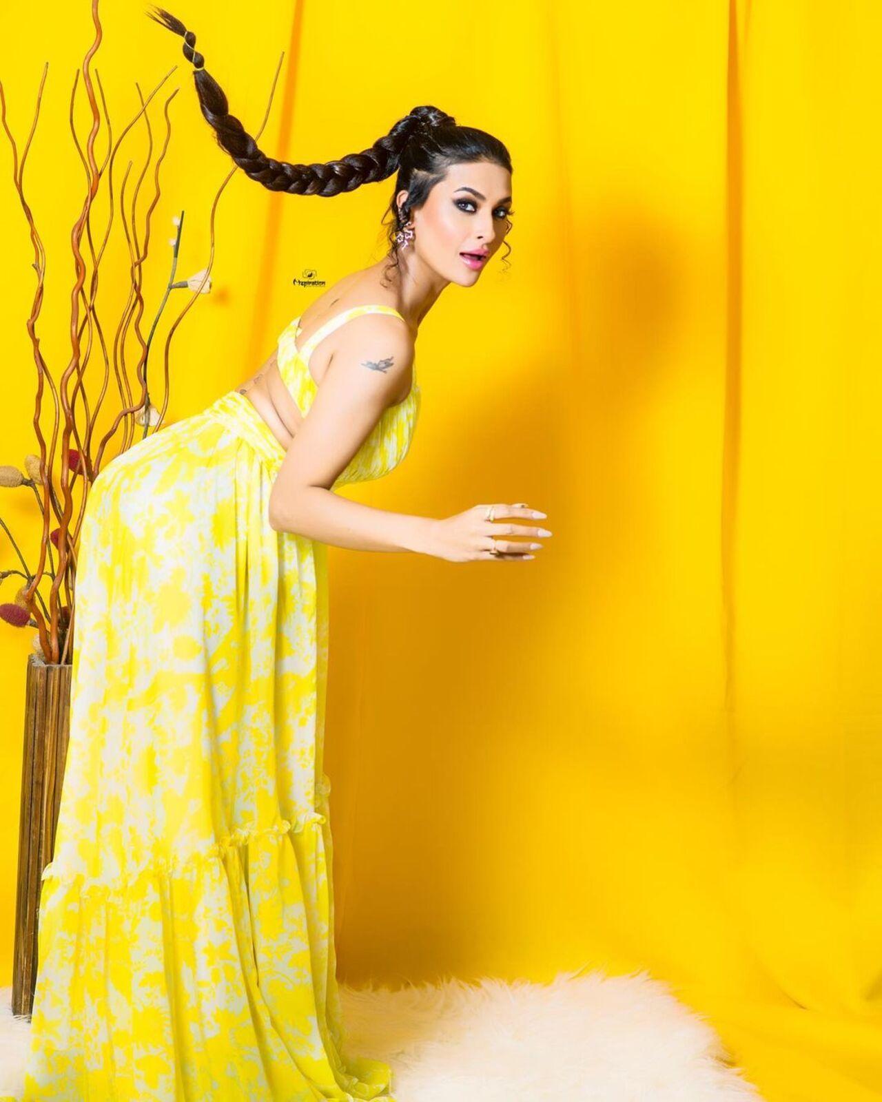 This look of Pavita Punia can be perfect for your brunch date. She opted for a pretty yellow gown and tied her hair in a classy braid