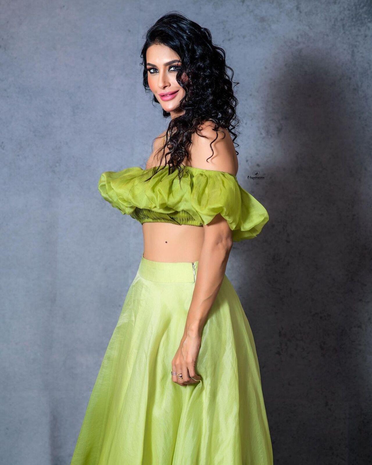 For this look, Pavitra wore a green crop top with a matching long skirt