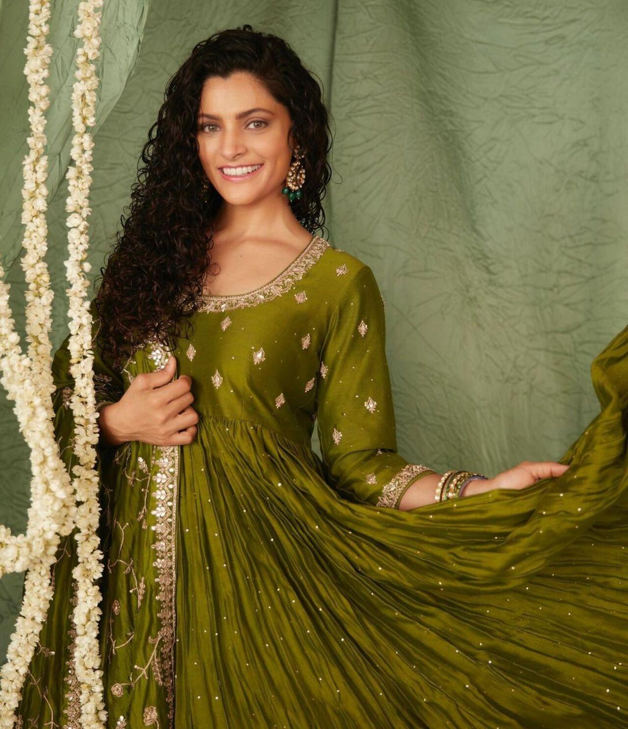 For one of her photoshoots, Saiyami Kher opted for this embroidered green Anarkali kurta set, the actress paired it with matching intricated earring 