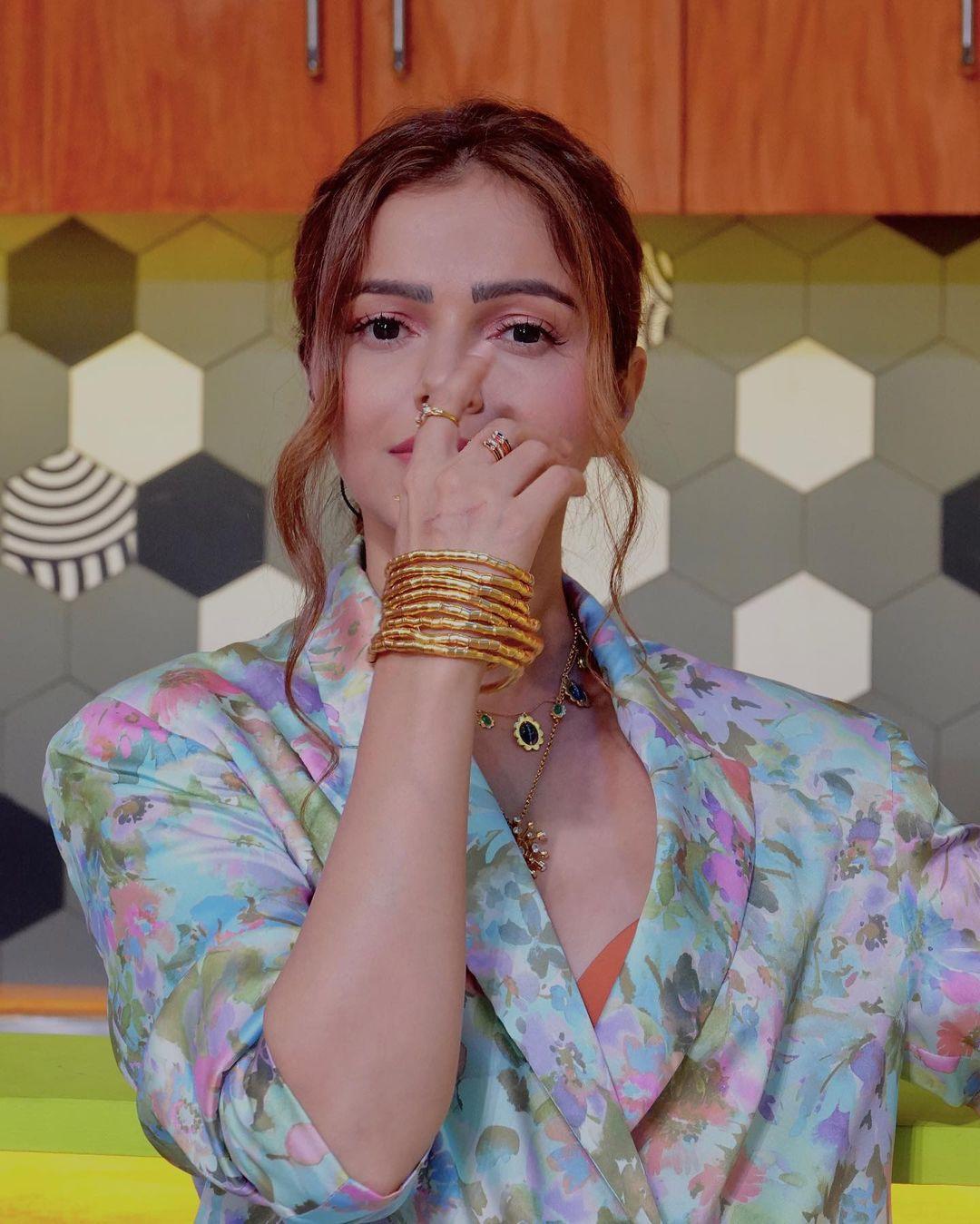 Rubina Dilaik exuded charm in a multi-coloured blue three-piece suit, complemented by a chic messy bun and subtle makeup