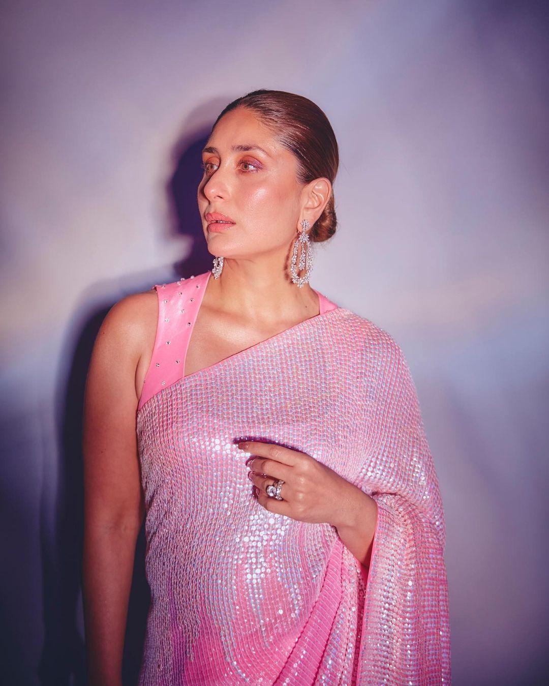 Kareena's choice of blouse harmonized seamlessly with the saree. The blouse, designed with a modern twist, featured a plunging neckline and intricately embroidered sleeves, striking a balance between tradition and contemporary fashion sensibilities.