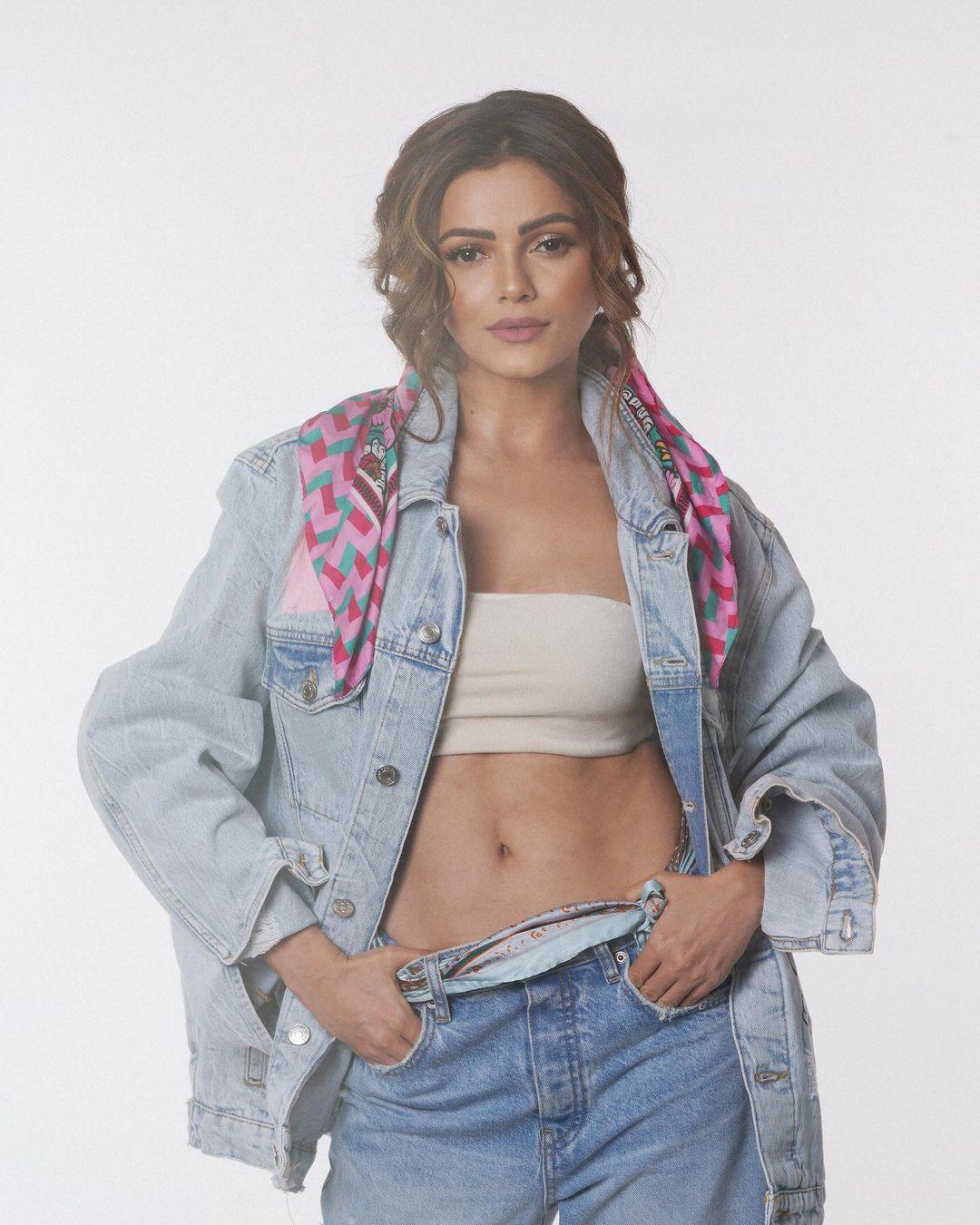 Rubina rocked a chic ensemble, pairing blue jeans with a denim jacket and a stylish crop top