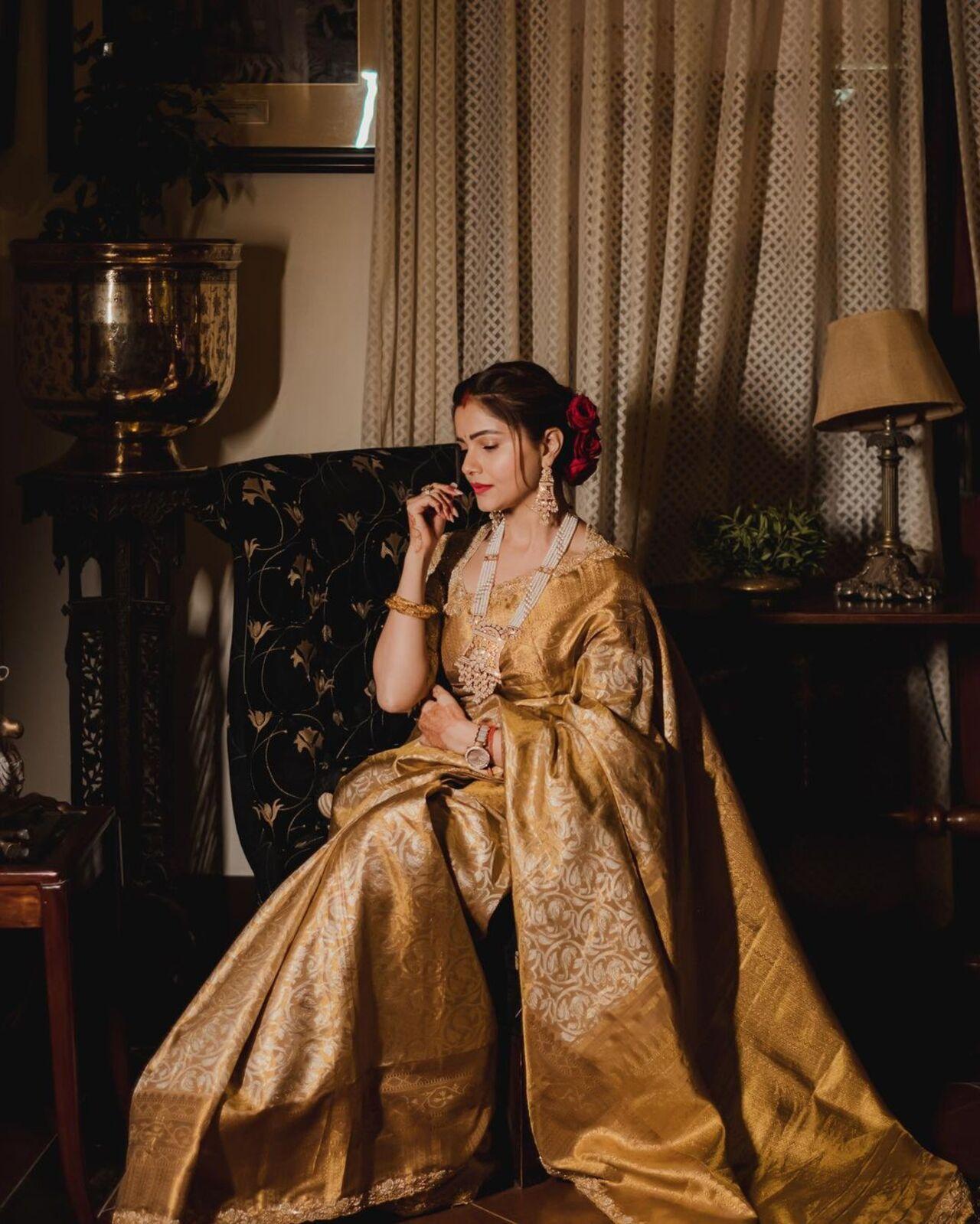 Rubina looked stunning in her golden saree with a matching heavily embroidered blouse. She completed her look with intricate jewellery, including a long necklace and earrings