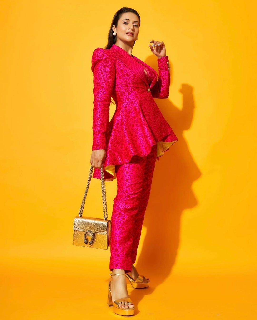  To complete her ensemble, Divyanka effortlessly elevated her look with a pair of dazzling golden heels, adding a touch of glamour to her already stunning appearance