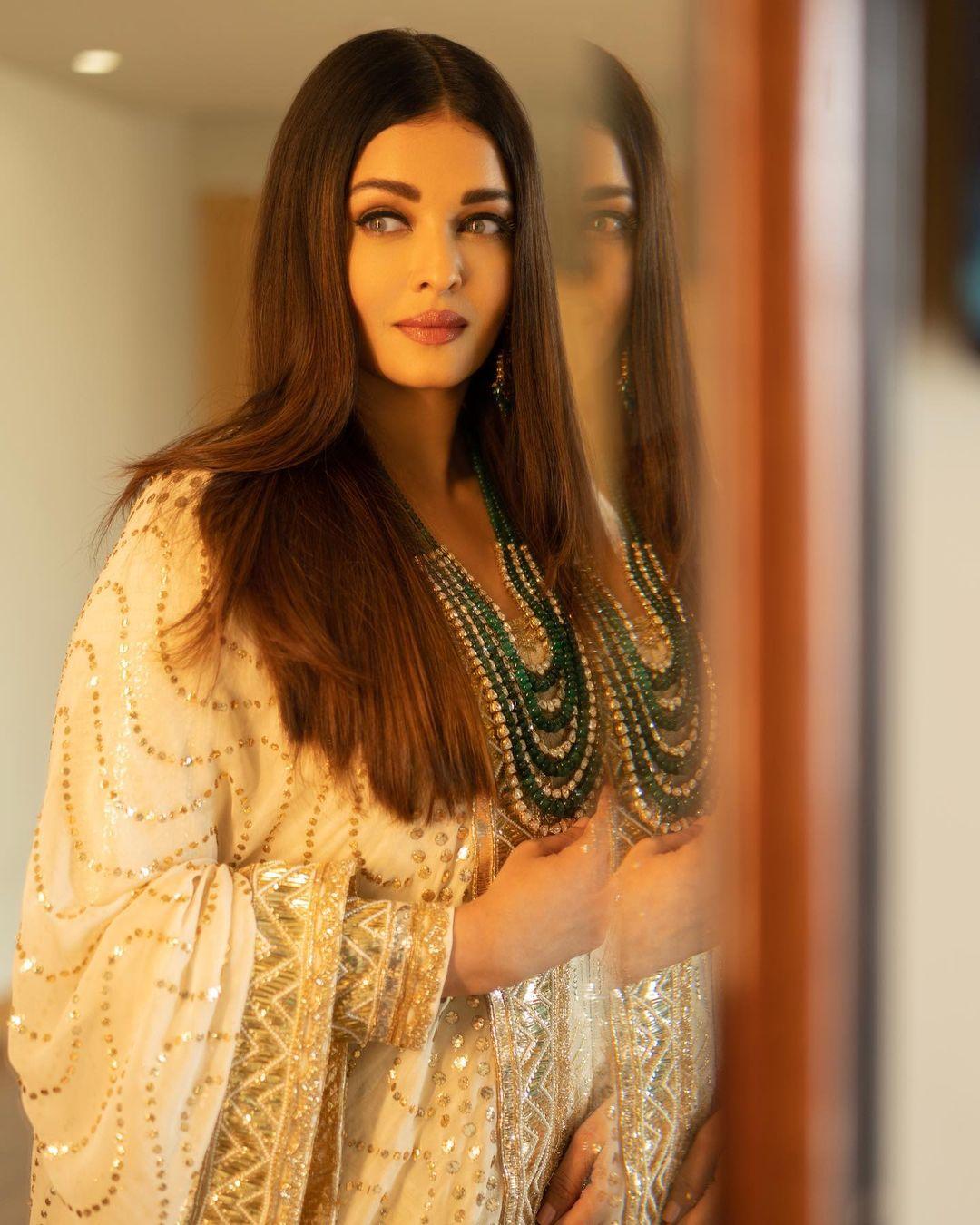 Adorned in a breathtaking white anarkali dress, Aishwarya Rai's appearance transcended the ordinary, exuding an otherworldly charm. 