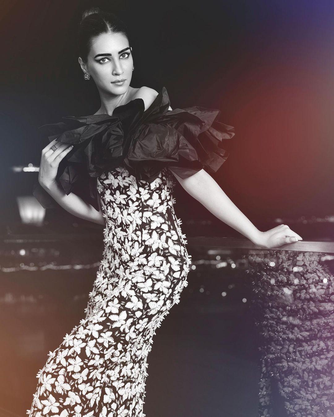The ruffles cascaded elegantly down the dress, creating an eye-catching and dynamic silhouette that exuded both charm and sophistication.