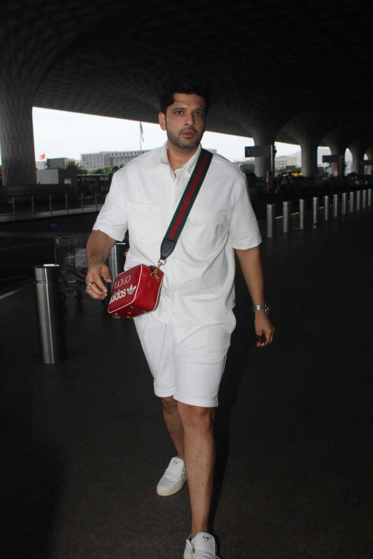 Karan Kundrra looked handsome in a white t-shirt paired with matching shorts