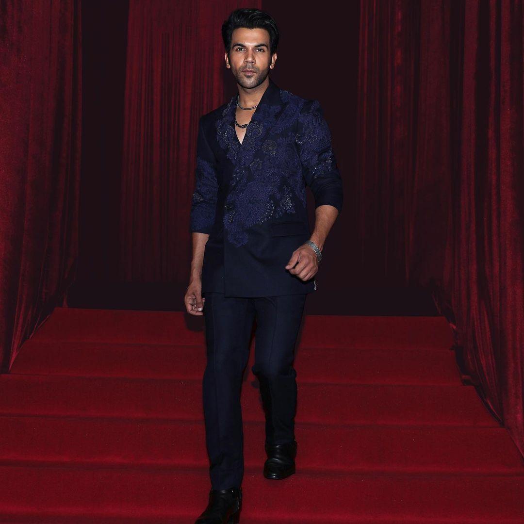 Rajkummar Rao effortlessly exudes casual coolness in a blue blazer featuring subtle floral patterns. The blazer strikes the perfect balance between relaxed comfort and a hint of style, embodying his laid-back yet refined approach to fashion.