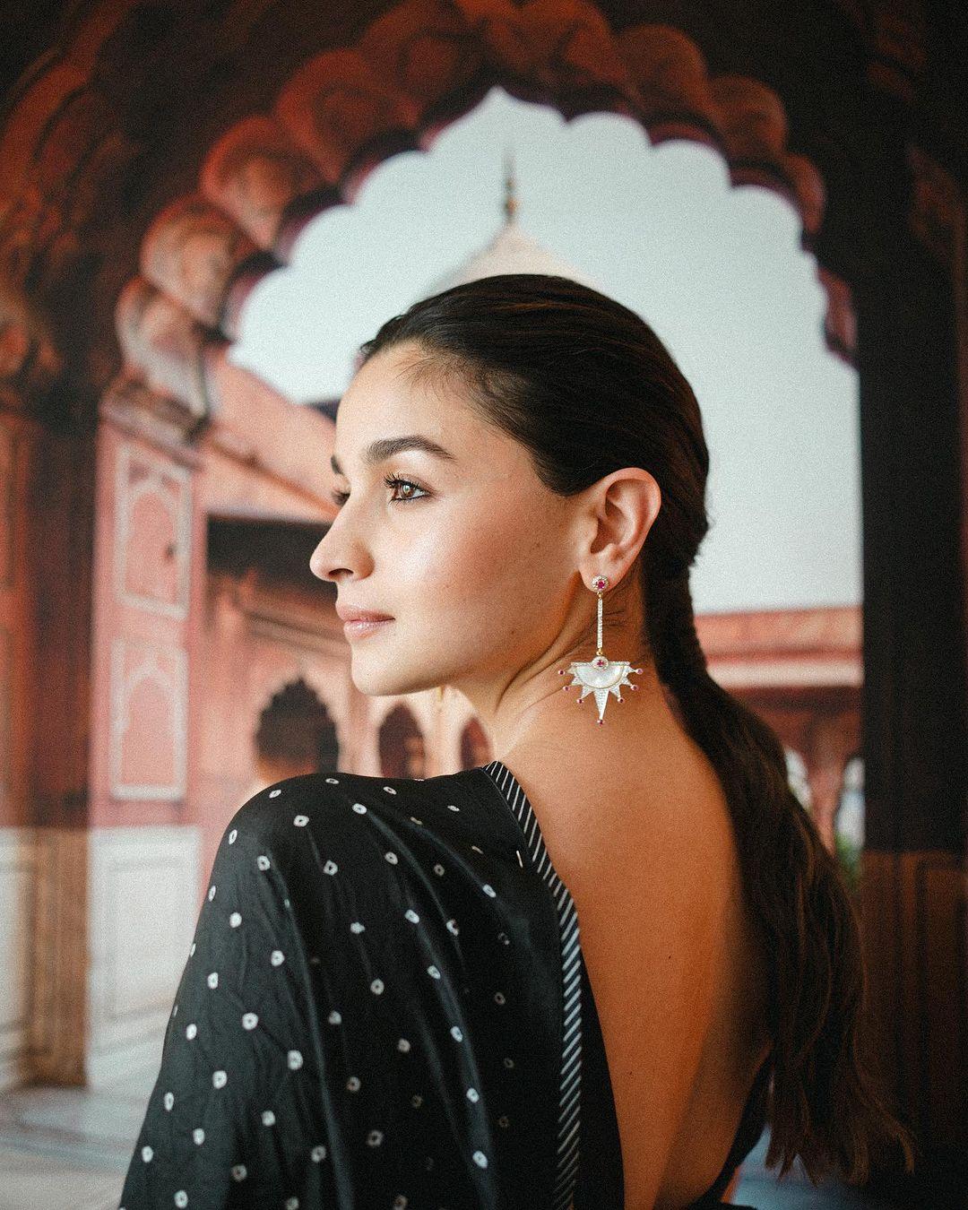 Alia Bhatt effortlessly donned a black polka dot saree that oozed charm. The playful yet sophisticated pattern brought a delightful twist to the traditional attire.