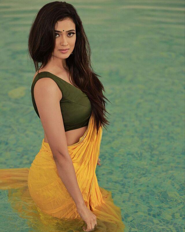 Shweta Tiwari oozed oomph in a captivating photoshoot where she posed in the middle of a water body 