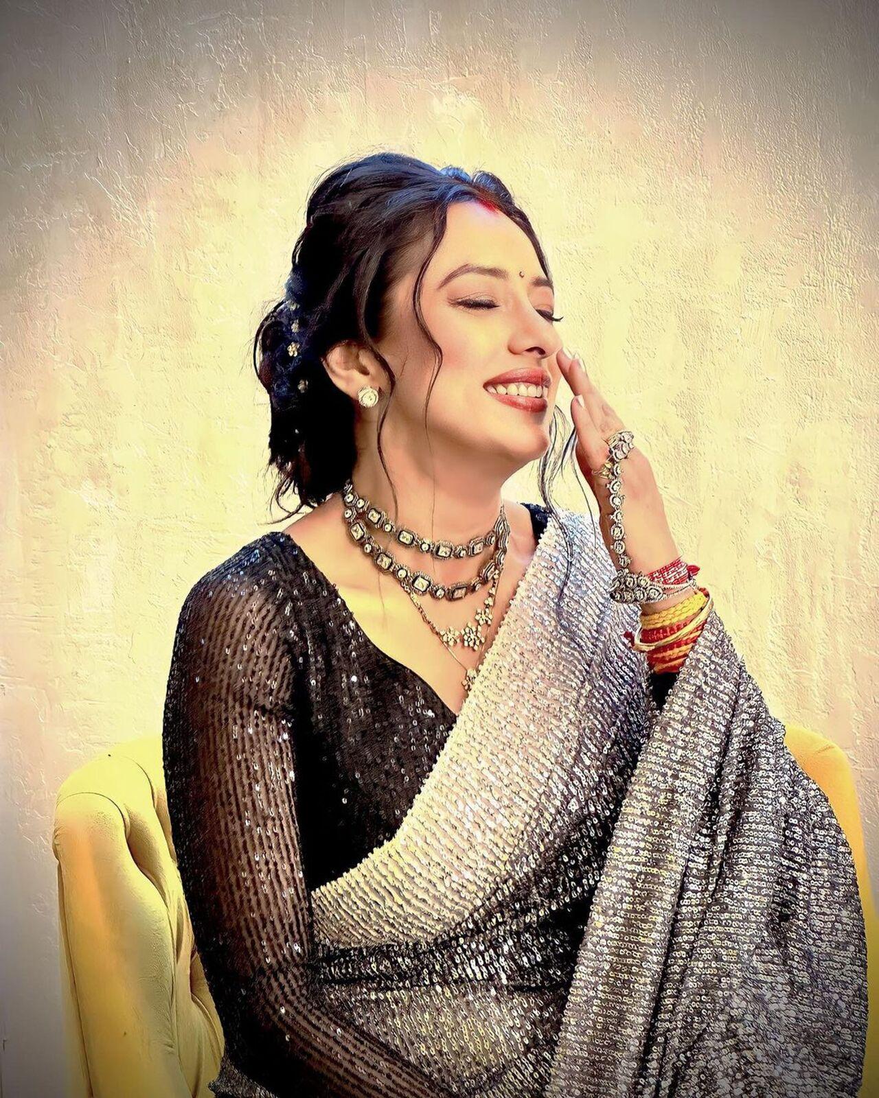 Sequin sarees exude a touch of glamour and luxury, and Rupali effortlessly blends them into her personal style