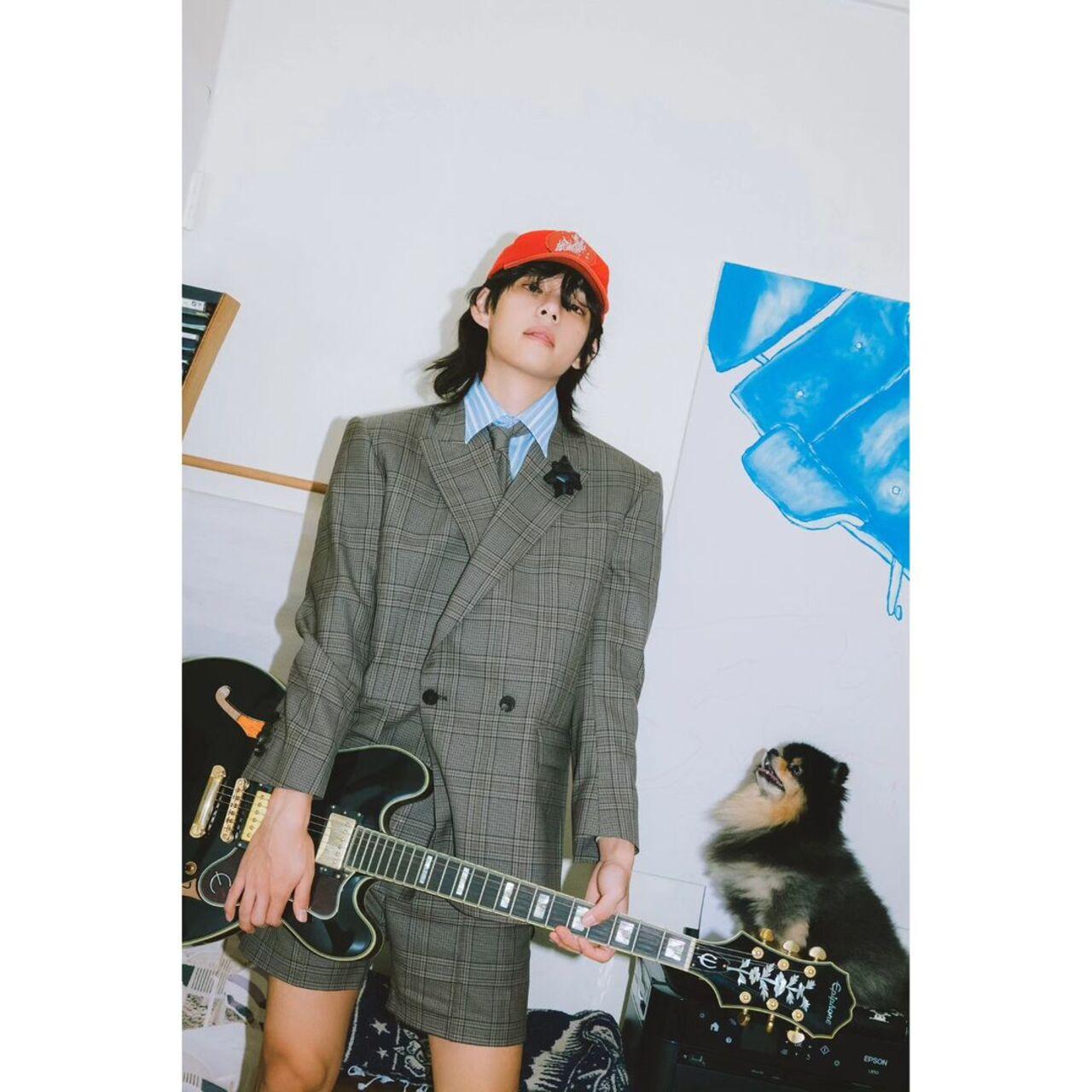 Picture Taehyung in a suave grey blazer, matched with formal shorts, layered over a striped and collared blue shirt - capped over with literally a red baseball cap. No one, we repeat, no one could pull this off except for Taehyung! Yes, Yeontan, we would look at V like that too if it were us