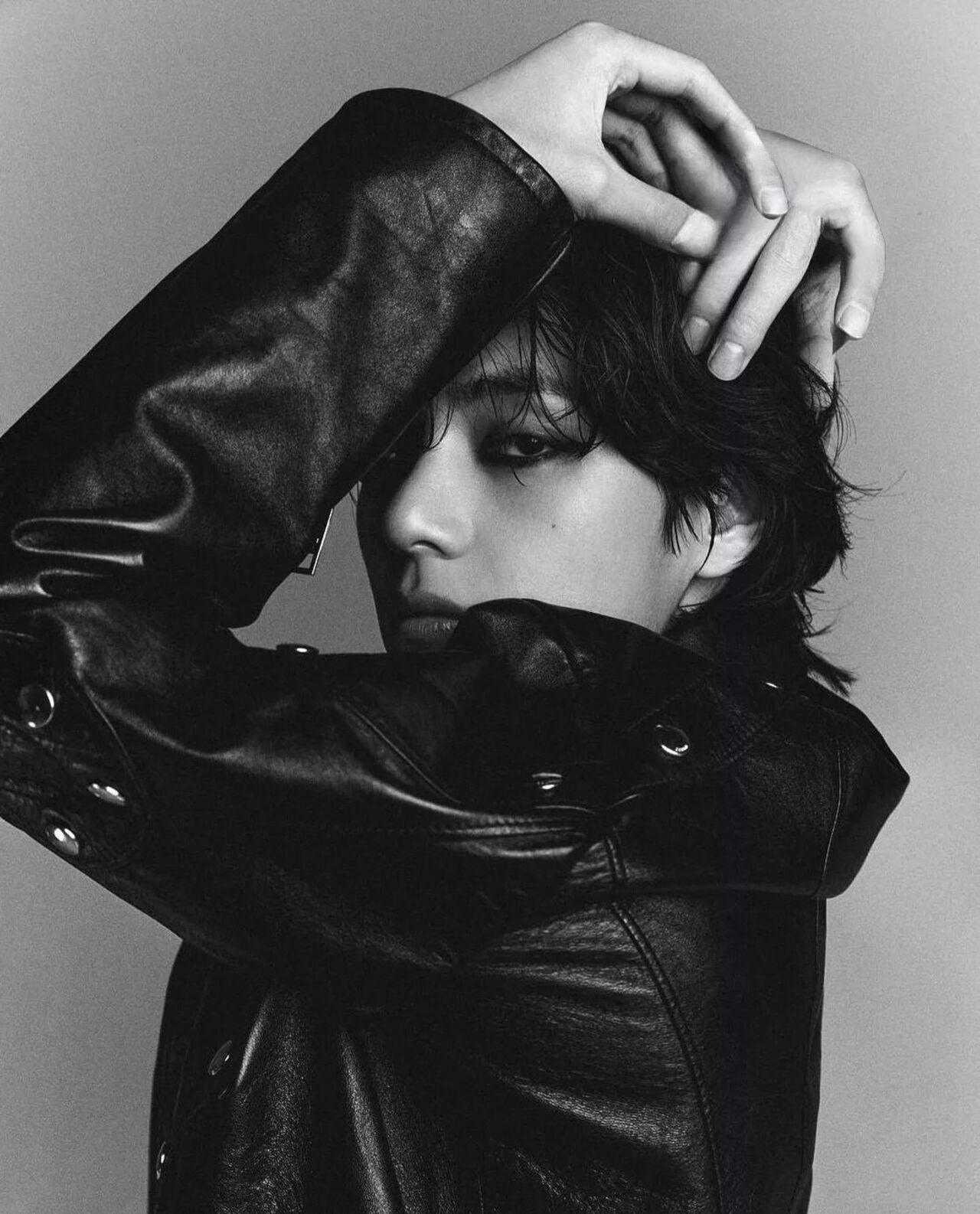 Lethal! Taehyung's intense gaze into the camera leaves us speechless. His kohled eyes also bring back memories from BTS's debut days where their music and fashion were more angsty and hip-hop oriented