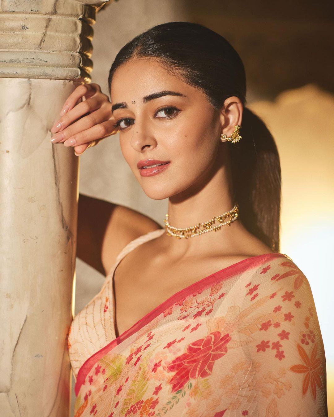 What caught the eye was not only the saree's vibrant palette but also the thoughtfully paired ivory blouse that added a touch of contemporary elegance.