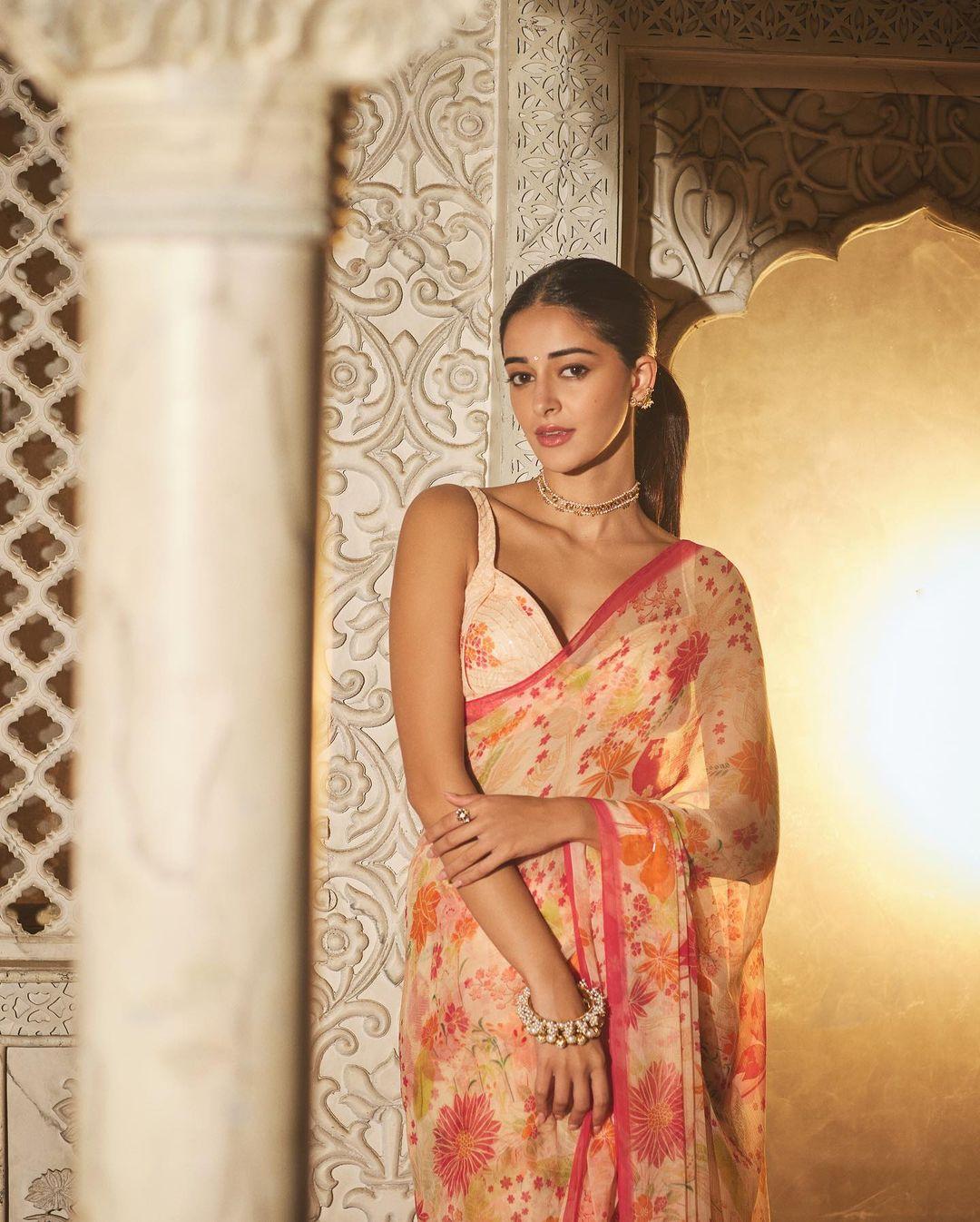 Ananya Panday gracefully donned a saree that seemed to echo the colors of a breathtaking sunset. This ensemble effortlessly brought together a symphony of warm and captivating hues. 