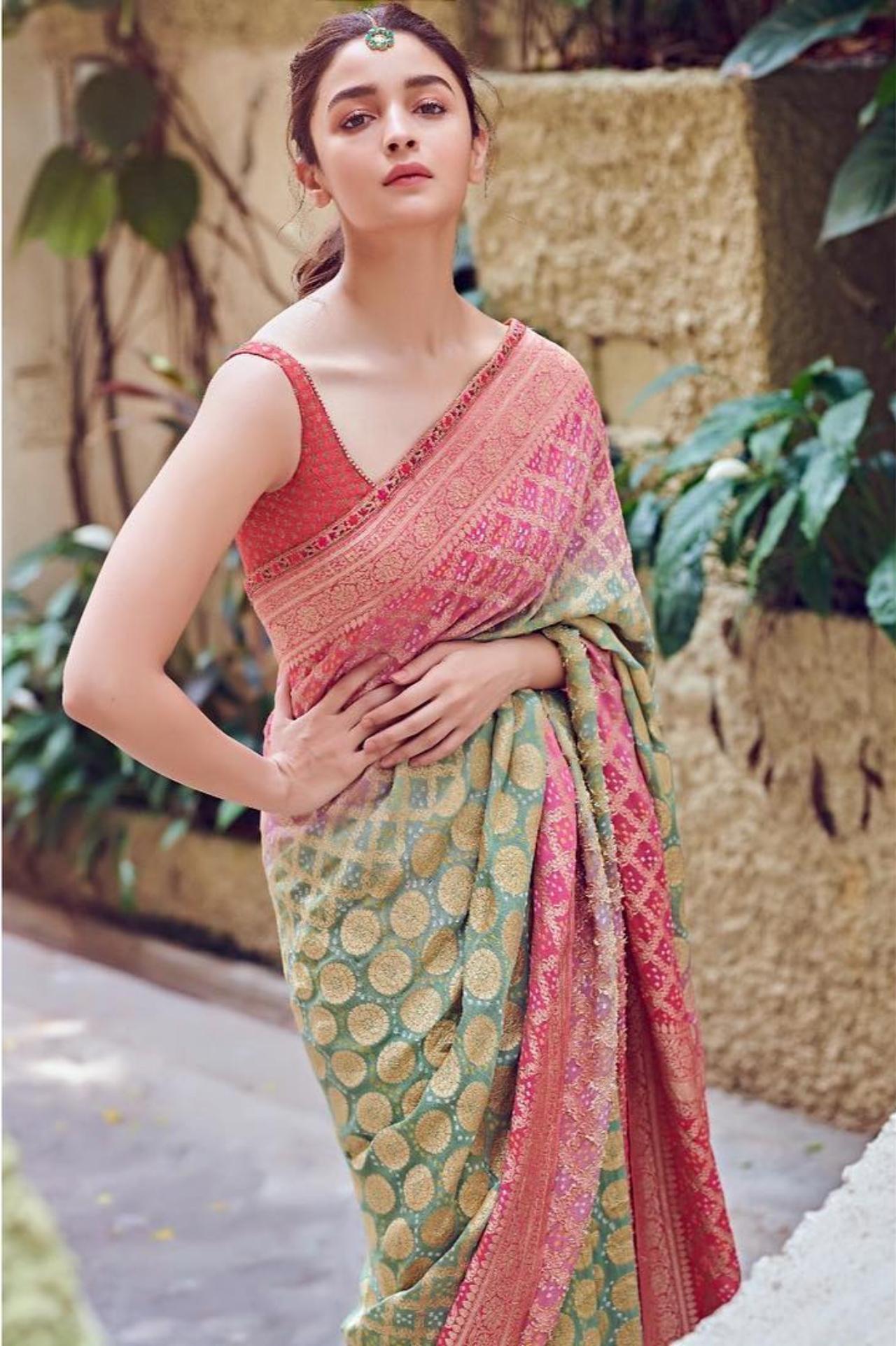 During the promotional events for 'Kalank' in April 2019, she was styled in a custom pink and olive bandhini sari by Tarun Tahiliani - and we can't get our eyes off of her! Such a bandhani drape is a quintessential bridal/festive piece that everyone should consider including in their wardrobe