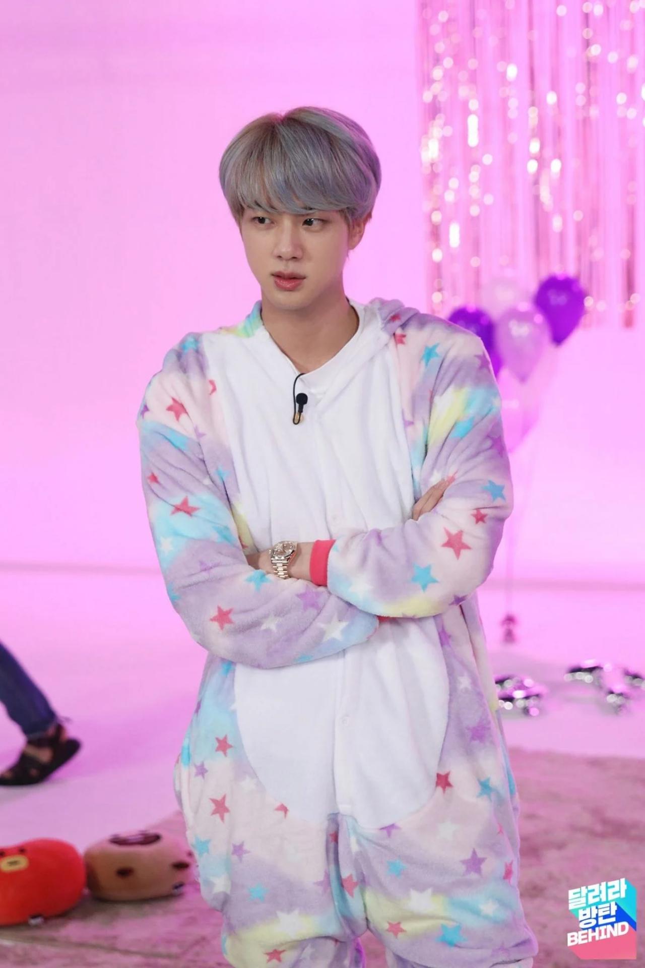 Jin never shies away from going that 'extra' mile to leave an impact with his ultra-fashionable choices. Take a look at this cute multicoloured unicorn pyjama set. In this Run! BTS episode, the seven members played games to get dibs on which pyjamas they could choose. Everyone hoped their dart would not land on Jin's outfit. But this oldest hyung is not Kim Seokjin without a reason - he chose this outfit voluntarily - despite winning the game!