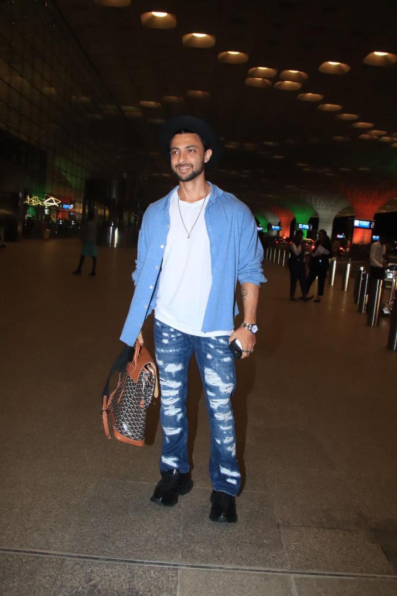 Aayush Sharma was spotted at the airport in a stylish blue denim paired with white T-shirt and blue shirt 