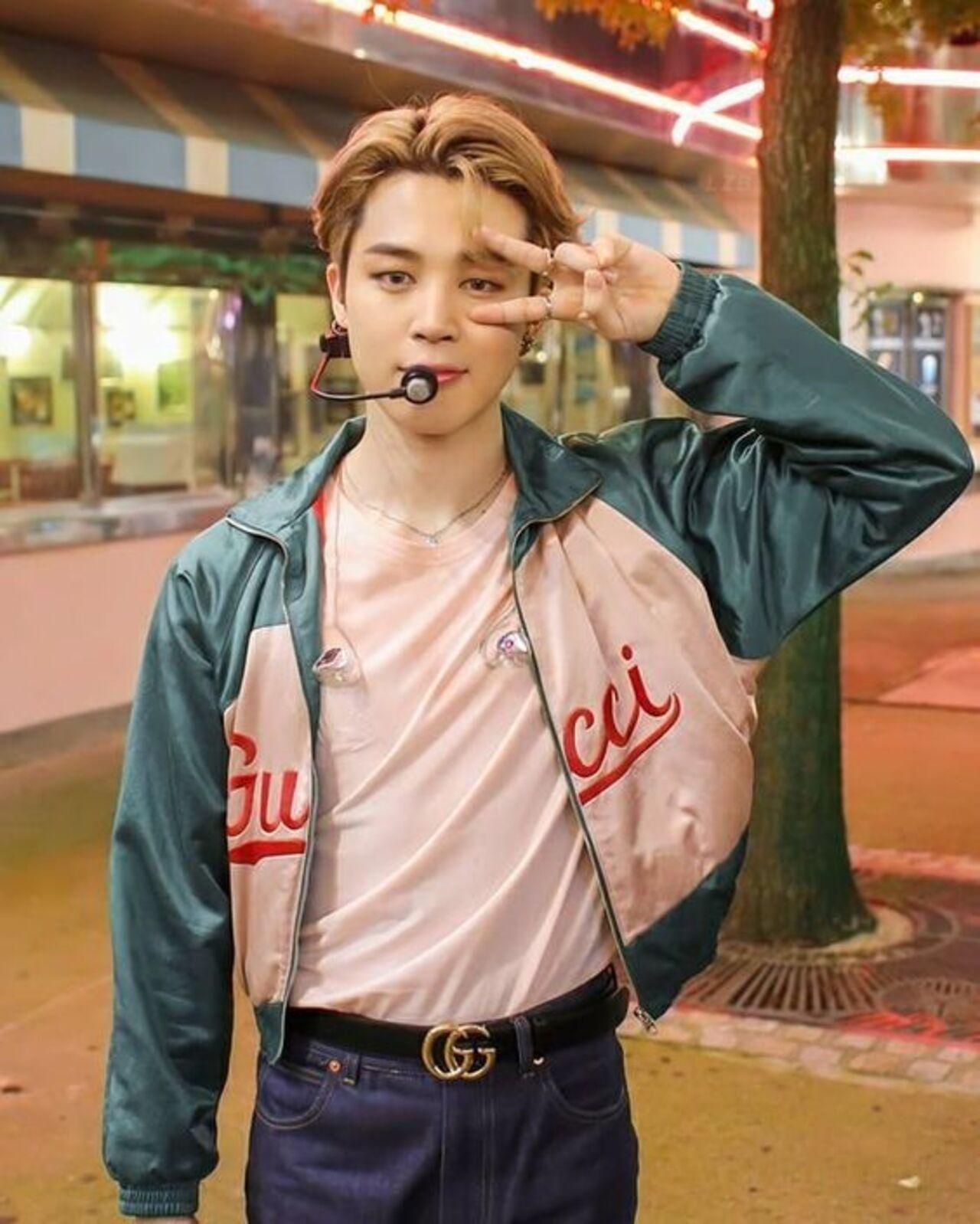 BTS's first summer single, 'Dynamite' saw the group in some of their best seasonal fashion yet. The aesthetics of the music video were based on '90s retro America with a disco vibe. However, Jimin put his own modern twist on this concept by donning the classic American white tee-washed out jeans combination and pairing it with a contemporary, colourful silky Gucci jacket