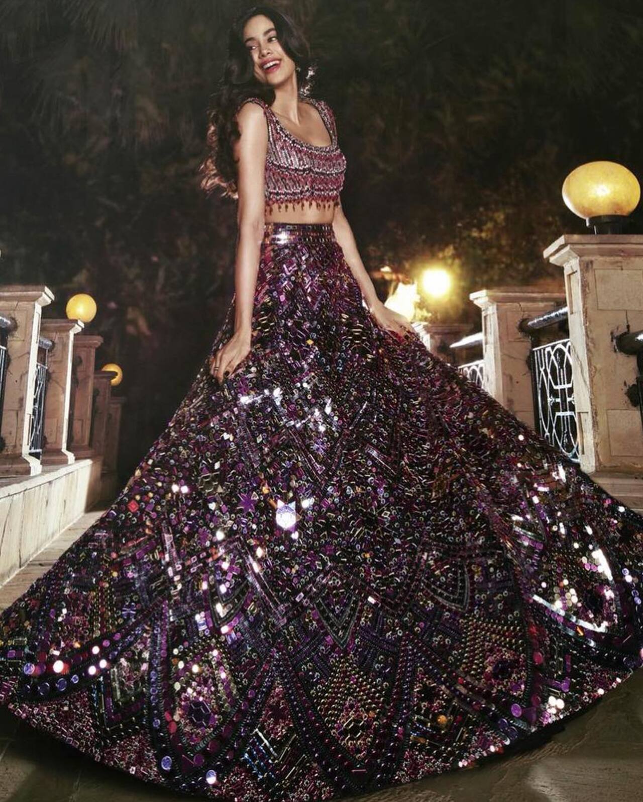For Priyanka Chopra and Nick Jonas' wedding reception, Janhvi opted for an ultra-glam look. She wore a wine-colored, sequin-rich Manish Malhotra lehenga, complete with a matching blouse adorned in crystals and beads