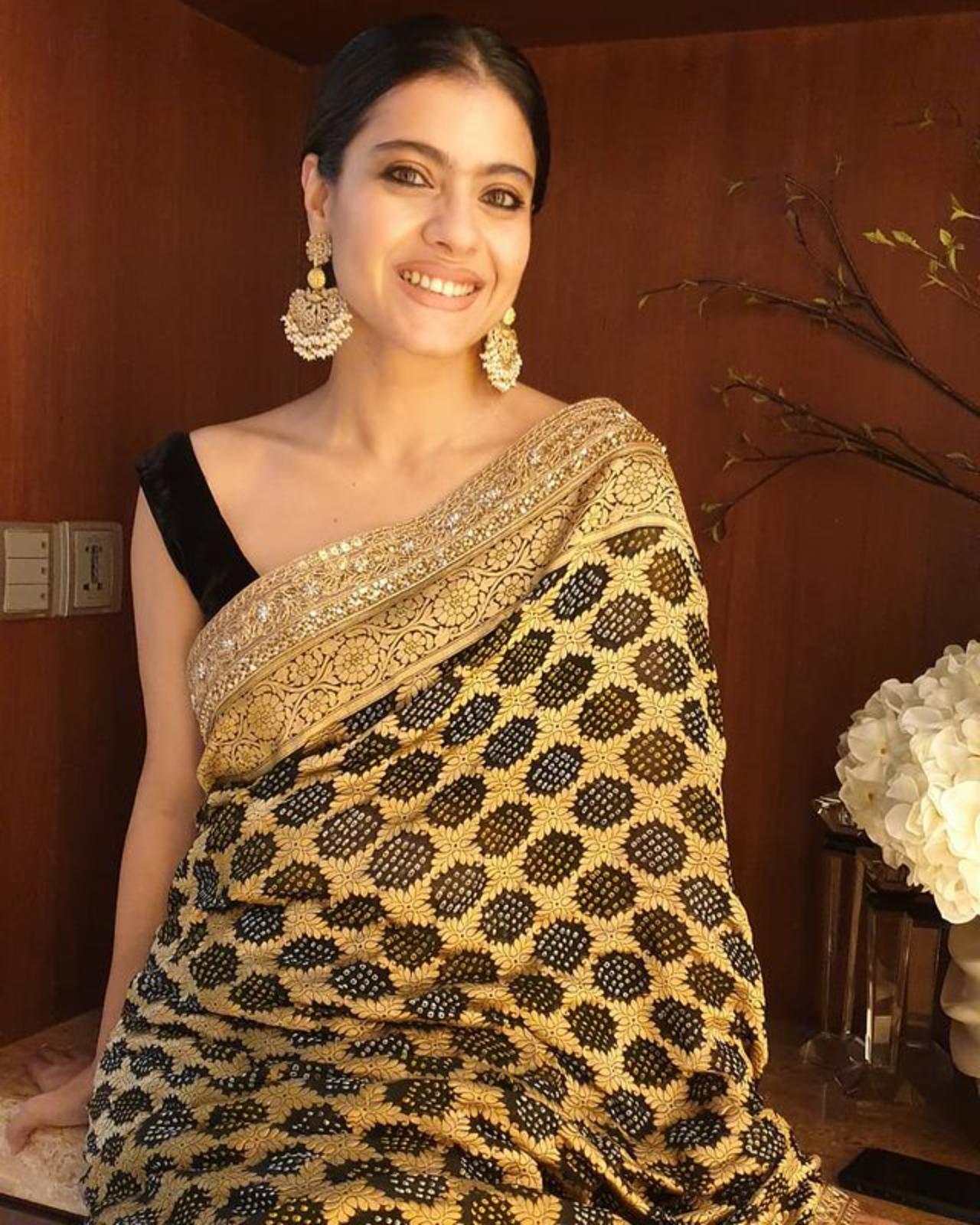 Kajol
Evergreen icon Kajol exuded timeless grace and elegance in her rich gold and black bandhani saree