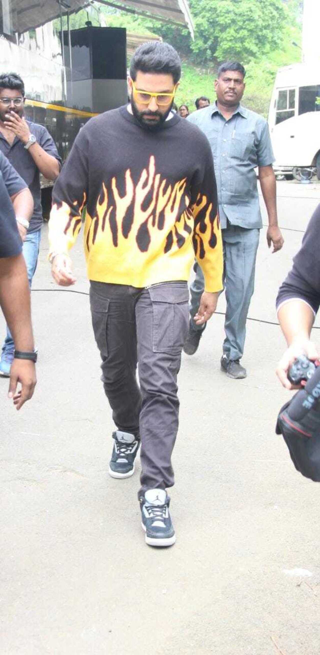 Abhishek Bachchan wore a black hoodie with a fire print as he was clicked in the city