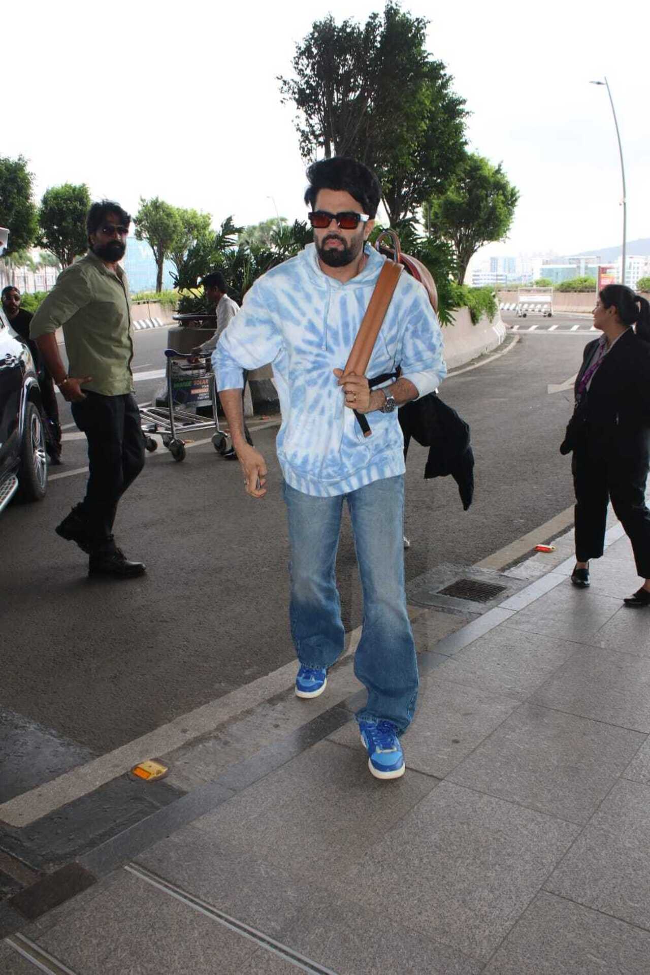 Actor-host Maniesh Paul opted for a cool blue-on-blue outfit for his airport look