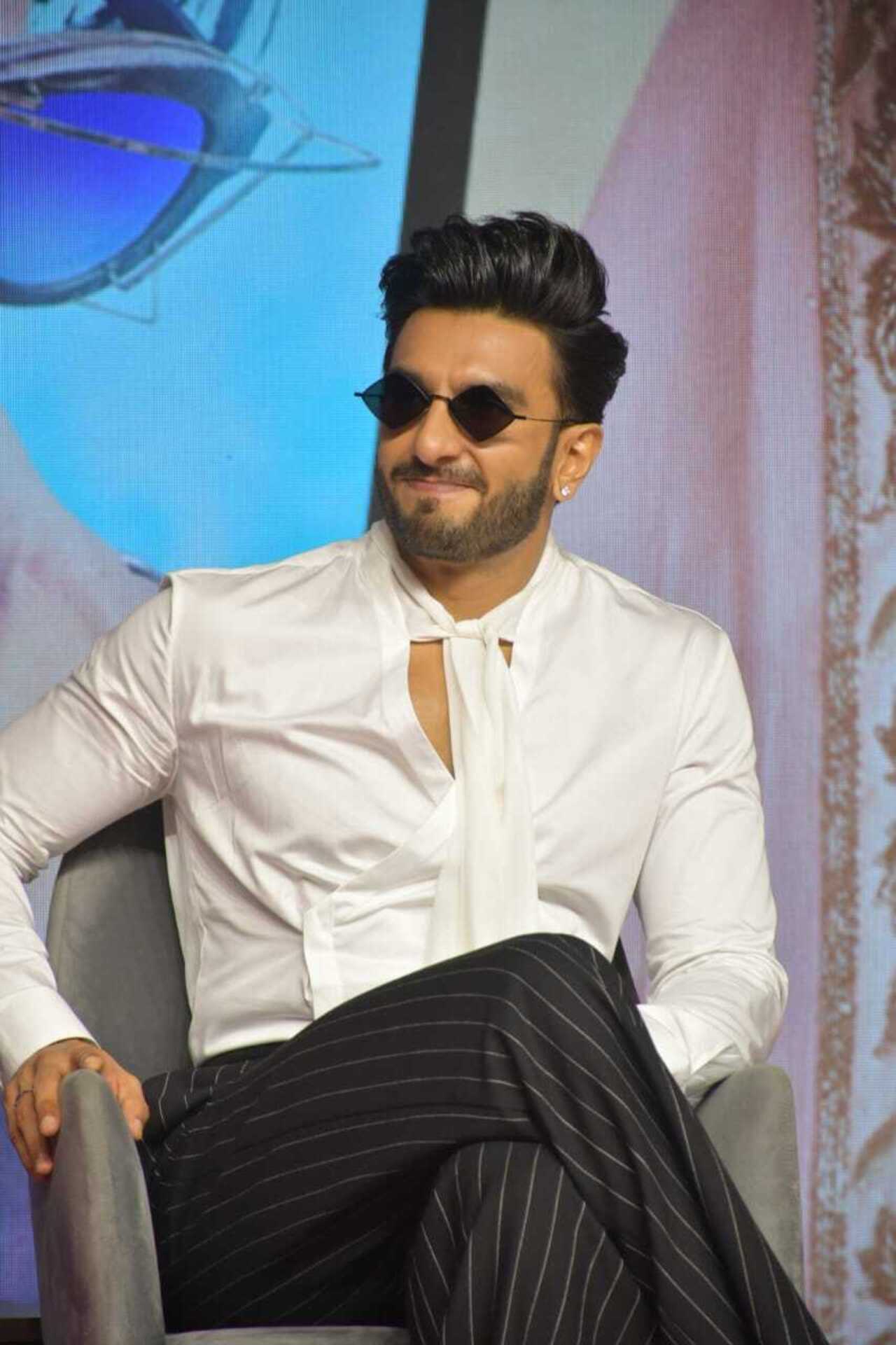 Ranveer Singh AKA Rocky wore a stylish white shirt with black striped pants